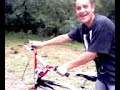 the kid thats rides a bike in a dangerous river
