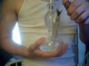 This is the Molino Mad scientist 2 v3.0. It has a glass on glass design, defused down stem, removable percolator, and ice catcher. The weed is Sensi Star which won first place in the HighTimes Cannabis Cup 1999, and second place in 2002.