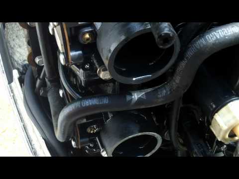 how to clean an outboard carburetor