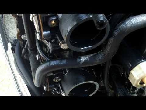 how to clean outboard carburetor