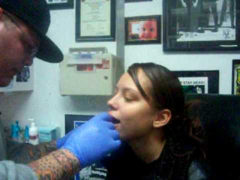 Me gettin my labret.. this is not my first piercing and definitly not the last. got this for my birthday which was jan 15th=)