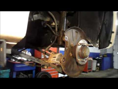 How To Replace Rear Brakes And Rotors On a 2004 Kia,Spectra