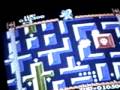 devil world was a game for the nes. you control a little gree dinosaur that is similar to the bubble bobble dinos. when you pick up a cross(see the religious part?), you can collect the little pellets and shoot fire from your mouth. the blue devil on the top of the screen controls where the screen is moving.