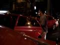 Drunk thai women in Silom, Bangkok, Thailand getting into a taxi with 2 other thai guys