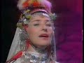 this is a short clip i got from a friend, not sure where it came from. if someone knows, please post and i'll include the information. 

i recognize the three women from the trio bulgarka - stoyanka boneva, yanka rupkina and eva georgieva. i don't know the other three, or the flautist. 

sorry i have so little information, but there is so little bulgarian music on youtube that i had to add this.