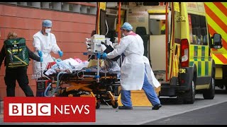 UK announces record Covid deaths as hospitals “overwhelmed”