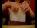 Tearing paper close up 1