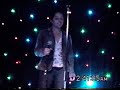 young lady singing in karaoke