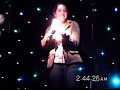 young lady singing in karaoke