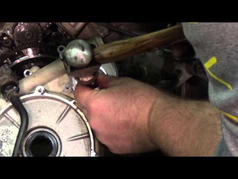 how to tighten belt on kfx 700