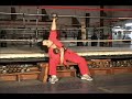 Sitting on a Bench Punching Up with Dumbells Sitting on a Bench Punching Up with Dumbells