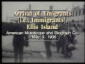 depicts scenes at the immigration depot and a nearby dock on ellis island. appears to show, first, a group of immigrants lined up to board a vessel leaving the island, then another group arriving at the island and being directed off of the dock and into the depot by a uniformed official.