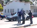 olympic torch runners in san francisco walking away