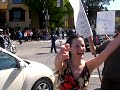 olympic torch runners in san francisco walking away