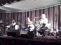 the opener for a great night, the sunday concert at ar ais aris 2008:  tom byrne on box and harmonica, michael carey on whistle, michael gallanagh on guitar, and matt mcgranahan on fiddle, here playing a hard-driving  version of big john mcneill's reel. tom and michael gallanagh, along with liz doherty and jim woods, were the organizers of the ar ais aris triad of festivals, and they did a brilliant job: check out buncranatradfest.com to see the incredible list of performers --and the concerts were only a small part of it: the entire town was alive with musicians and music for three great days.