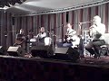 the opener for a great night, the sunday concert at ar ais aris 2008:  tom byrne on box and harmonica, michael carey on whistle, michael gallanagh on guitar, and matt mcgranahan on fiddle, here playing a hard-driving  version of big john mcneill's reel. tom and michael gallanagh, along with liz doherty and jim woods, were the organizers of the ar ais aris triad of festivals, and they did a brilliant job: check out buncranatradfest.com to see the incredible list of performers --and the concerts were only a small part of it: the entire town was alive with musicians and music for three great days.