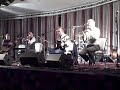 the opener for a great night, the sunday concert at ar ais aris 2008:  tom byrne on box and harmonica, michael carey on whistle, michael gallanagh on guitar, and matt mcgranahan on fiddle, here playing a hard-driving  version of big john mcneill's reel. tom and michael gallanagh, along with liz doherty and jim woods, were the organizers of the ar ais aris triad of festivals, and they did a brilliant job: check out buncranatradfest.com to see the incredible list of performers --and the concerts were only a small part of it: the entire town was alive with musicians and music for three great days.