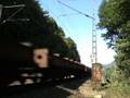 BR140 in Doppeltraktion mit leeren Stahlrollenanhängern von Koblenz nach Bonn bei Rolandswerth