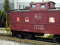 My layout is a shelf only 12 inches wide. It occupies an area 6 feet by 12 feet. I run the trains using the MTH DCS command system.