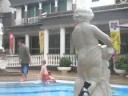 Dad watching the kids swim