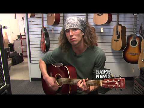 Wielding - KMPH NEWS EXCLUSIVE- We caught up with Kai the hatchet wielding hitchhiking hero on his life journey. Kai decided to showcase his musical talent with this or...