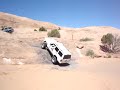 jeep-cherokee-succesfully-climbing-dump-bump-in-moab.html