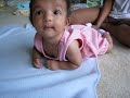 at 4 months annika is beginning to roll
