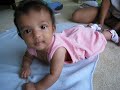 at 4 months annika is beginning to roll
