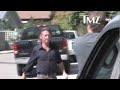 sean penn kicks paparazzi