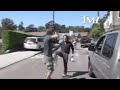 sean penn kicks paparazzi