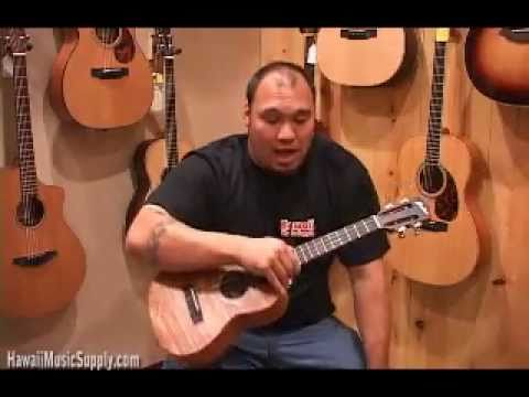 how to hold a ukulele properly