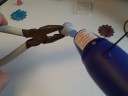 This video shows how to use ink and some embossing powder, and even some clear nail polish to re-colour the brads you no longer use because they are the wrong colour.  Now you can exactly match your brads to your project.