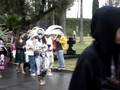 Aztec Dancers Lead the Crowd in the March Into the Cemetery