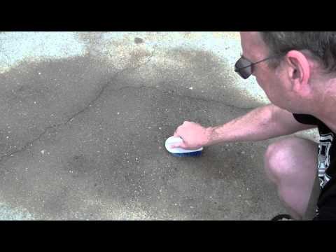 how to remove oil stains from a driveway
