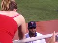 my friend tori getting her jersey signed by torii hunter...
