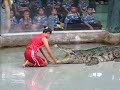 Pretty Girl puts Head into Crocodiles Mouth