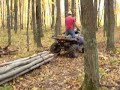 Skidding logs with ATV Polaris 700