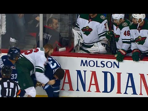 Wild and Jets scuffle with 10 seconds left as Winnik and Tanev scrap