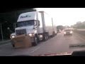 FedEx Guy Pushing Stove with Truck