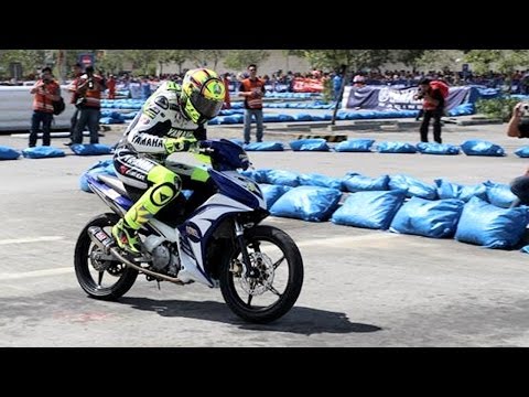135 LC - MotoGP rider Valentino Rossi goes to Philippines. Ride the Sniper MX during the opening of Yamaha GP underbone race and for the Typhoon Haiyan Yolanda surviv...