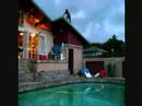 Jumping off of a mansion's roof into a pool