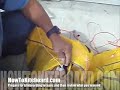 Kiteboarding:How to Kiteboard: Repairs: Installing strut  #1