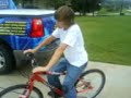 kid slams into basketball goal