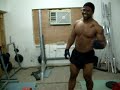 me attempting a 457 lb deadlift. if you can't tell my left hand grip strength sucks.