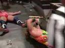 RVD overshoots a dive to the outside & hits announce table