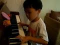 7 yr old piano: Cush plays Chasing Cars
