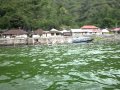 from Trunyan to Kuburan cemetery by boat Bali island.AVI