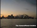 Sunrise next morning from across the river, towers...