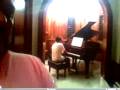 GuitarHeroPhenom: Danny plays Bach on piano.
