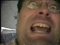 Guy skis down tube escalator 2